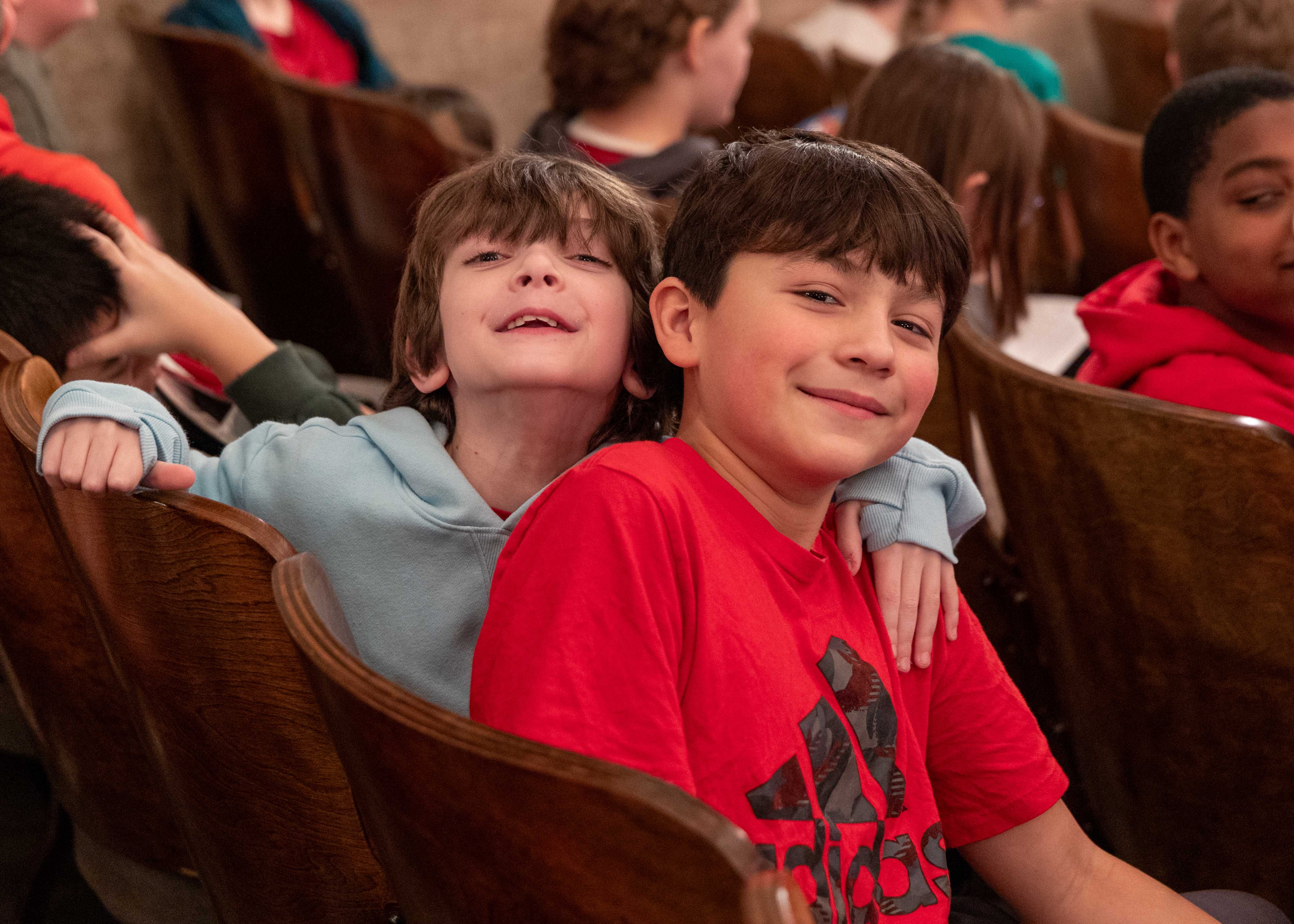 Two middle school students smile for a picture